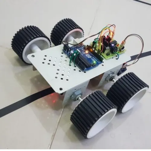 Student building a robot